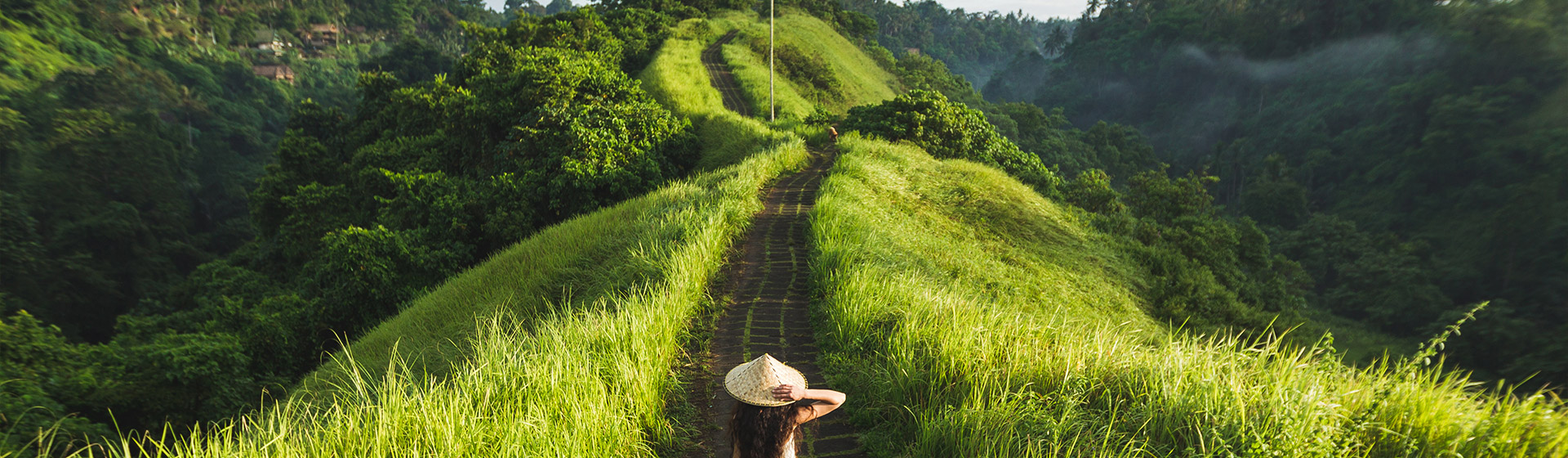 A lady walking along Campuhan Ridge Walk in Ubud, Bali